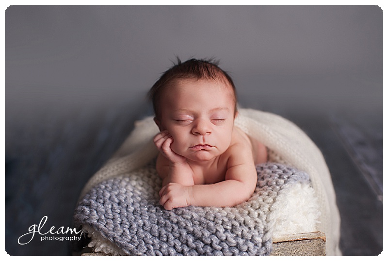 Newborn baby girl in studio